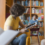 teenagers looking each other library 23 2147860570